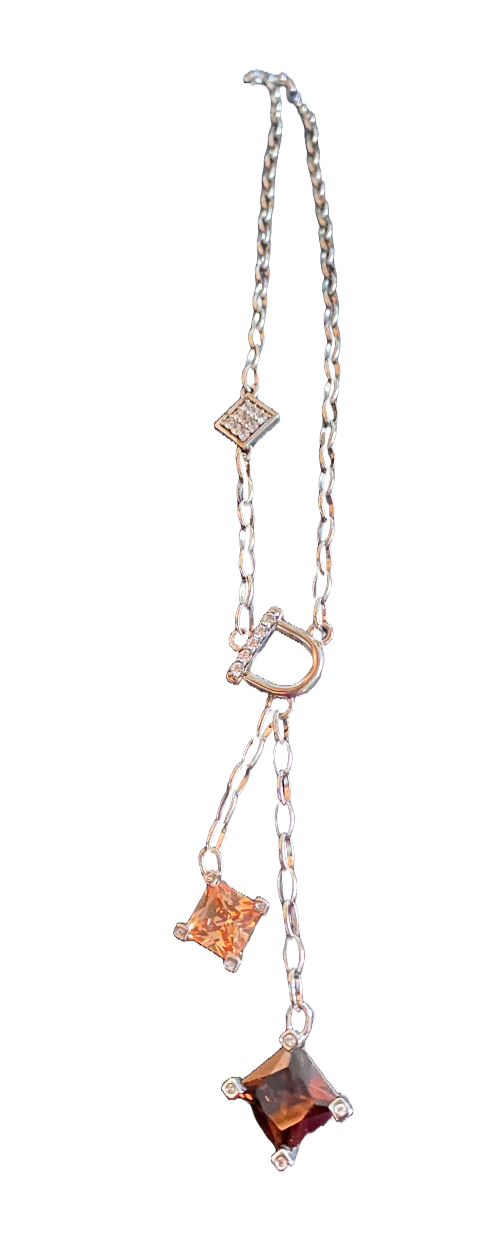 Zinzi ketting bezet met vele kleine witte zirkonia en een vierkant geslepen champagne zirkonia.